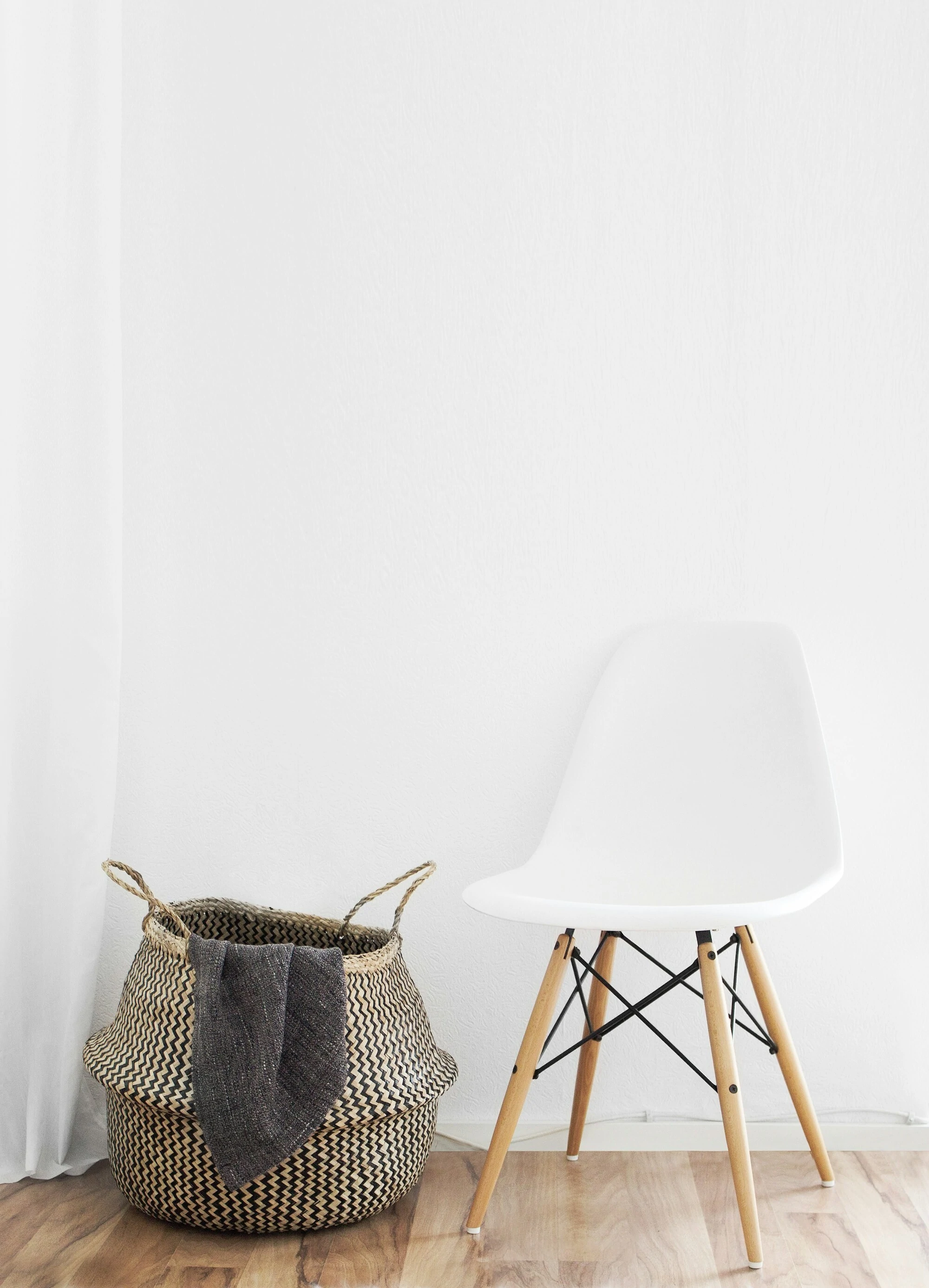 Freshly Painted white wall with white chair